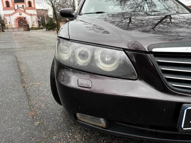 Красный Хендай Грандер, объемом двигателя 3.3 л и пробегом 246 тыс. км за 5990 $, фото 8 на Automoto.ua