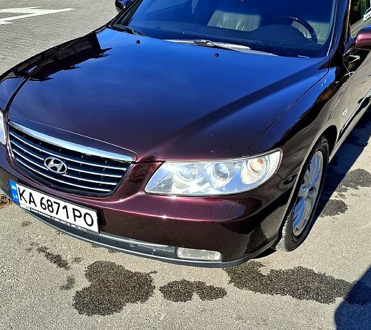 Червоний Хендай Грандер, об'ємом двигуна 3.3 л та пробігом 280 тис. км за 6500 $, фото 5 на Automoto.ua