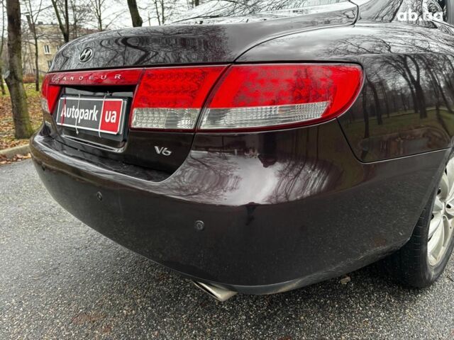 Червоний Хендай Грандер, об'ємом двигуна 3.3 л та пробігом 246 тис. км за 7490 $, фото 10 на Automoto.ua