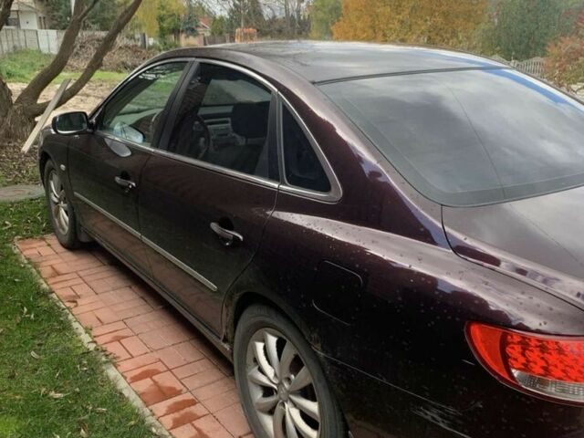 Красный Хендай Грандер, объемом двигателя 3.3 л и пробегом 400 тыс. км за 5000 $, фото 3 на Automoto.ua