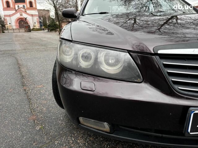 Червоний Хендай Грандер, об'ємом двигуна 3.3 л та пробігом 246 тис. км за 7490 $, фото 8 на Automoto.ua