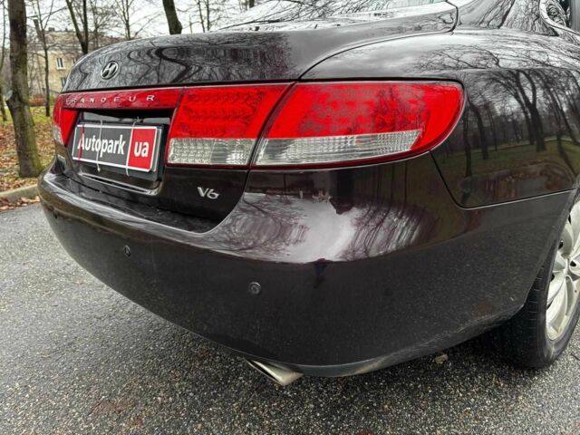 Красный Хендай Грандер, объемом двигателя 3.3 л и пробегом 246 тыс. км за 5990 $, фото 10 на Automoto.ua