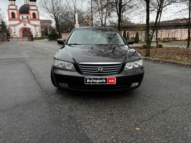 Червоний Хендай Грандер, об'ємом двигуна 3.3 л та пробігом 246 тис. км за 7490 $, фото 1 на Automoto.ua