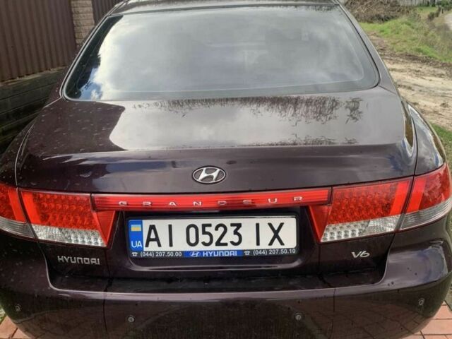 Красный Хендай Грандер, объемом двигателя 3.3 л и пробегом 400 тыс. км за 5000 $, фото 1 на Automoto.ua