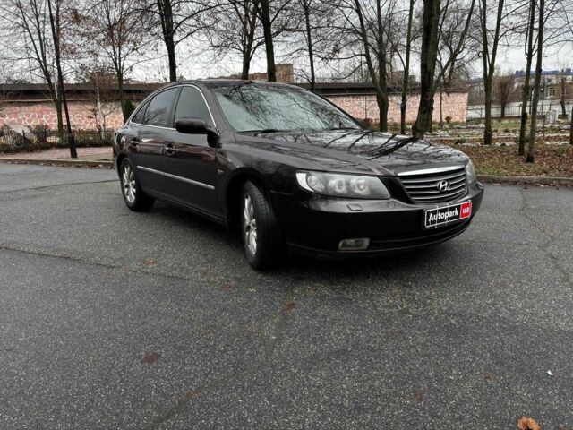 Красный Хендай Грандер, объемом двигателя 3.3 л и пробегом 246 тыс. км за 5990 $, фото 6 на Automoto.ua