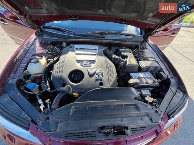 Красный Хендай Грандер, объемом двигателя 3.34 л и пробегом 304 тыс. км за 6700 $, фото 11 на Automoto.ua