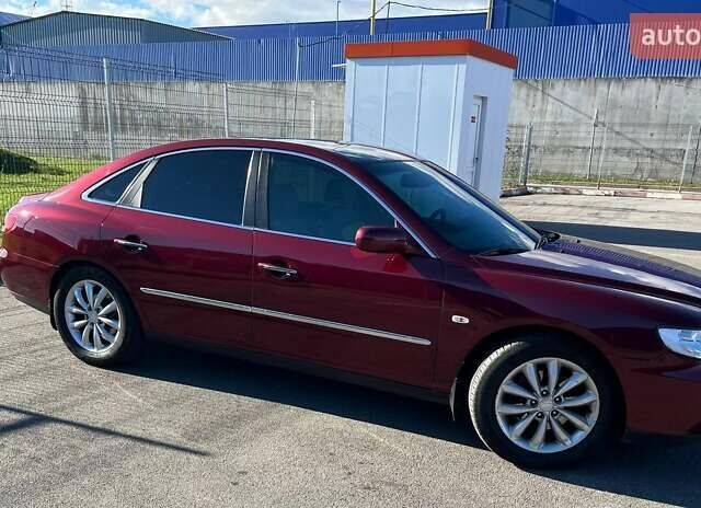 Красный Хендай Грандер, объемом двигателя 3.34 л и пробегом 304 тыс. км за 6700 $, фото 2 на Automoto.ua