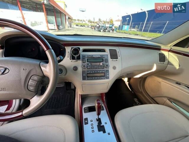 Красный Хендай Грандер, объемом двигателя 3.34 л и пробегом 304 тыс. км за 6700 $, фото 8 на Automoto.ua