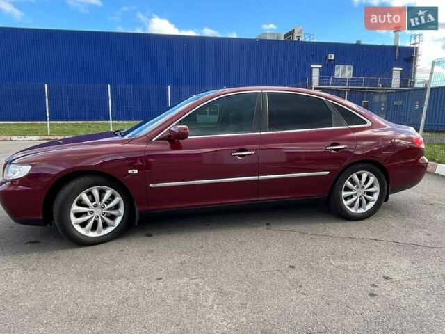 Красный Хендай Грандер, объемом двигателя 3.34 л и пробегом 304 тыс. км за 6700 $, фото 16 на Automoto.ua