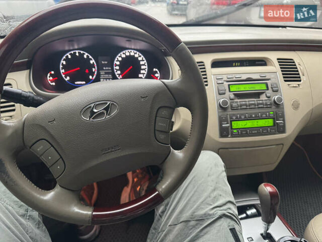 Красный Хендай Грандер, объемом двигателя 3.3 л и пробегом 187 тыс. км за 5400 $, фото 5 на Automoto.ua
