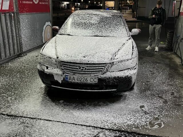 Красный Хендай Грандер, объемом двигателя 3.3 л и пробегом 345 тыс. км за 7000 $, фото 5 на Automoto.ua