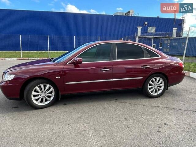 Красный Хендай Грандер, объемом двигателя 3.34 л и пробегом 304 тыс. км за 6700 $, фото 17 на Automoto.ua