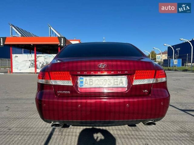 Красный Хендай Грандер, объемом двигателя 3.34 л и пробегом 304 тыс. км за 6700 $, фото 4 на Automoto.ua