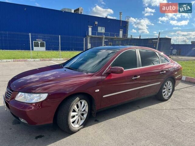 Красный Хендай Грандер, объемом двигателя 3.34 л и пробегом 304 тыс. км за 6700 $, фото 13 на Automoto.ua