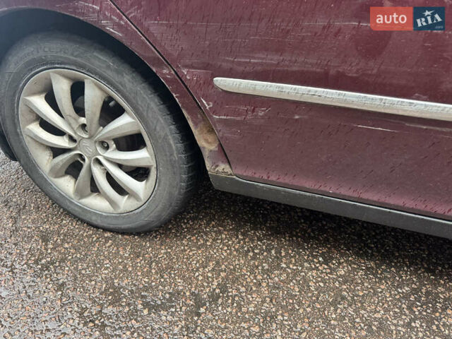 Красный Хендай Грандер, объемом двигателя 3.3 л и пробегом 187 тыс. км за 5400 $, фото 9 на Automoto.ua