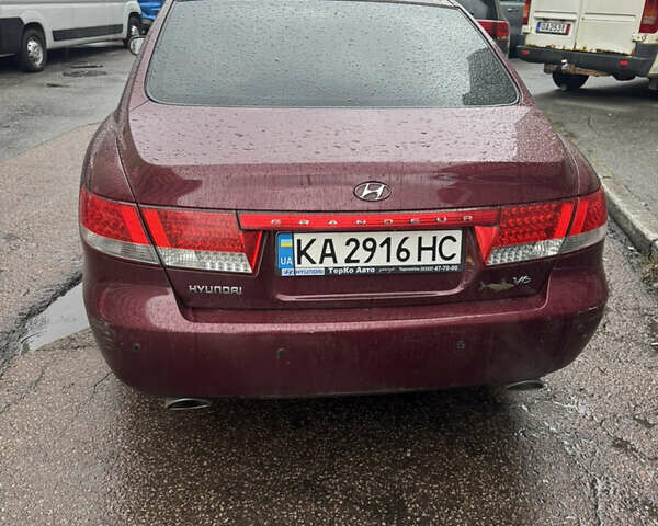 Красный Хендай Грандер, объемом двигателя 3.3 л и пробегом 187 тыс. км за 5400 $, фото 4 на Automoto.ua