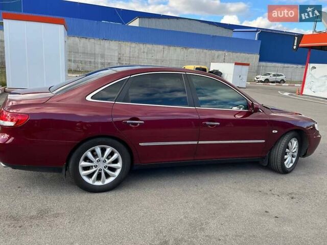 Красный Хендай Грандер, объемом двигателя 3.34 л и пробегом 304 тыс. км за 6700 $, фото 12 на Automoto.ua