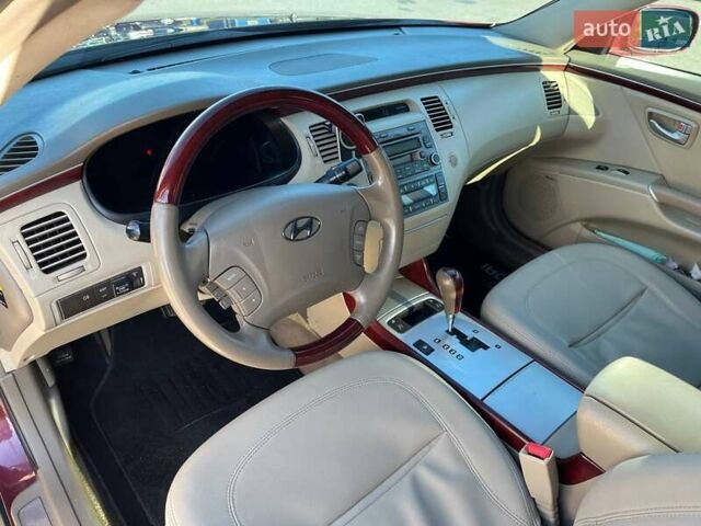 Красный Хендай Грандер, объемом двигателя 3.34 л и пробегом 304 тыс. км за 6700 $, фото 5 на Automoto.ua