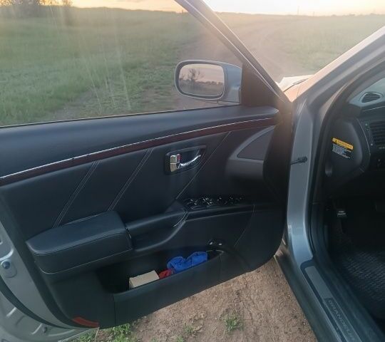 Серый Хендай Грандер, объемом двигателя 2.7 л и пробегом 280 тыс. км за 6700 $, фото 6 на Automoto.ua