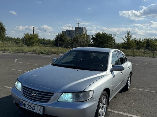 Серый Хендай Грандер, объемом двигателя 3.3 л и пробегом 250 тыс. км за 4999 $, фото 3 на Automoto.ua