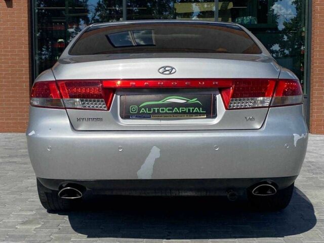 Серый Хендай Грандер, объемом двигателя 3.3 л и пробегом 237 тыс. км за 5290 $, фото 5 на Automoto.ua