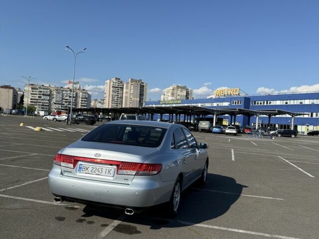 Серый Хендай Грандер, объемом двигателя 3.3 л и пробегом 250 тыс. км за 4999 $, фото 7 на Automoto.ua