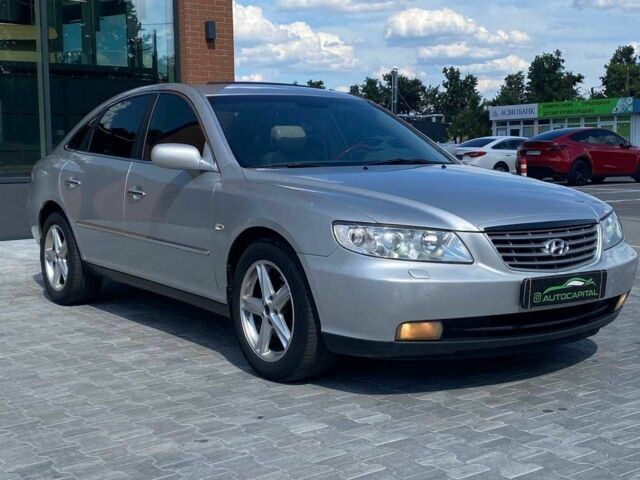 Серый Хендай Грандер, объемом двигателя 3.3 л и пробегом 237 тыс. км за 5290 $, фото 3 на Automoto.ua