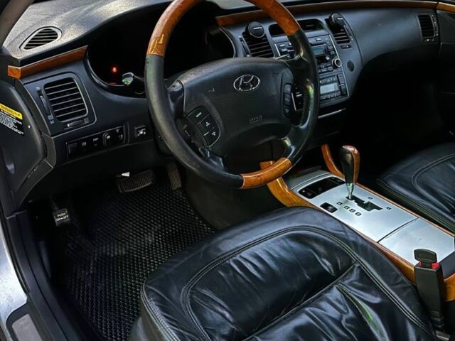 Серый Хендай Грандер, объемом двигателя 3.3 л и пробегом 200 тыс. км за 5800 $, фото 3 на Automoto.ua
