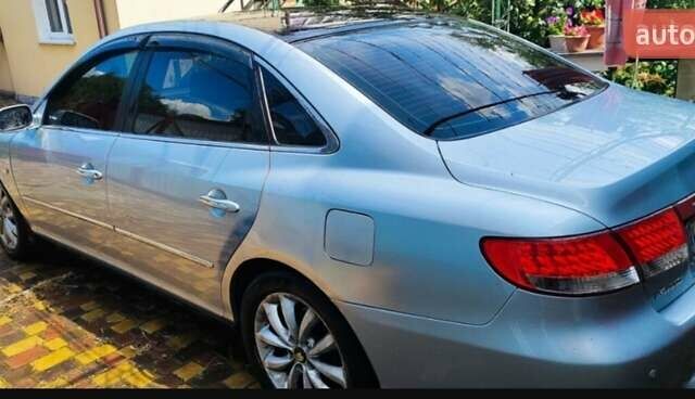 Серый Хендай Грандер, объемом двигателя 3.34 л и пробегом 300 тыс. км за 4600 $, фото 4 на Automoto.ua