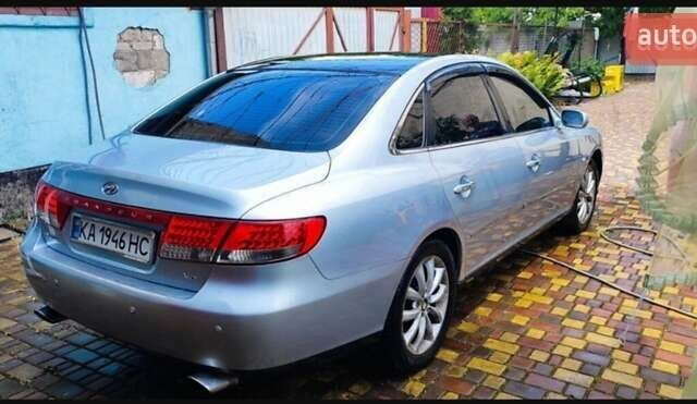 Серый Хендай Грандер, объемом двигателя 3.34 л и пробегом 300 тыс. км за 4600 $, фото 5 на Automoto.ua