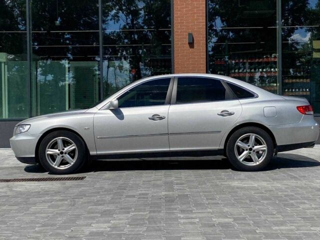 Серый Хендай Грандер, объемом двигателя 3.3 л и пробегом 237 тыс. км за 5290 $, фото 4 на Automoto.ua