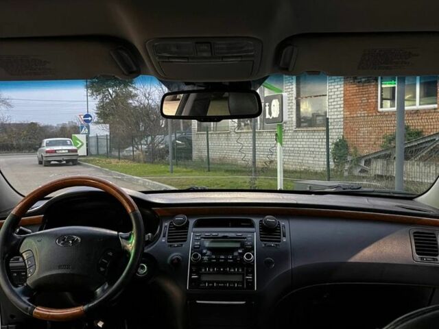 Серый Хендай Грандер, объемом двигателя 3.3 л и пробегом 200 тыс. км за 5800 $, фото 6 на Automoto.ua