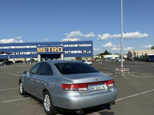 Серый Хендай Грандер, объемом двигателя 3.3 л и пробегом 250 тыс. км за 4999 $, фото 4 на Automoto.ua