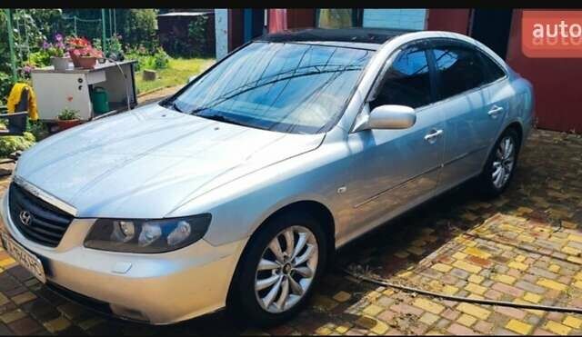 Серый Хендай Грандер, объемом двигателя 3.34 л и пробегом 300 тыс. км за 4600 $, фото 7 на Automoto.ua