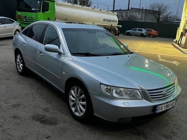 Серый Хендай Грандер, объемом двигателя 3.3 л и пробегом 200 тыс. км за 5800 $, фото 1 на Automoto.ua