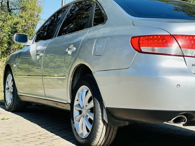 Серый Хендай Грандер, объемом двигателя 3.3 л и пробегом 290 тыс. км за 5700 $, фото 7 на Automoto.ua