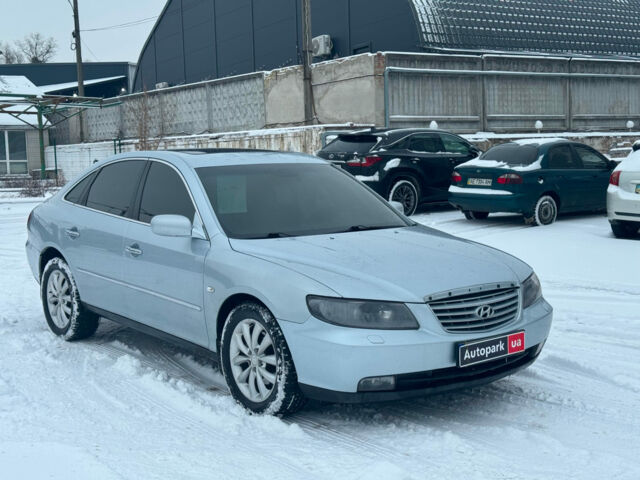 Сірий Хендай Грандер, об'ємом двигуна 3.3 л та пробігом 214 тис. км за 6690 $, фото 2 на Automoto.ua