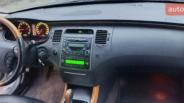 Серый Хендай Грандер, объемом двигателя 3.3 л и пробегом 300 тыс. км за 4900 $, фото 2 на Automoto.ua