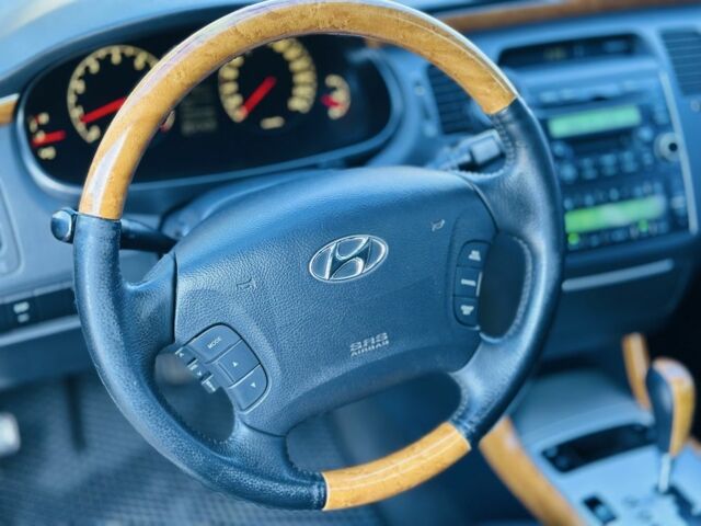 Серый Хендай Грандер, объемом двигателя 3.3 л и пробегом 290 тыс. км за 5700 $, фото 20 на Automoto.ua