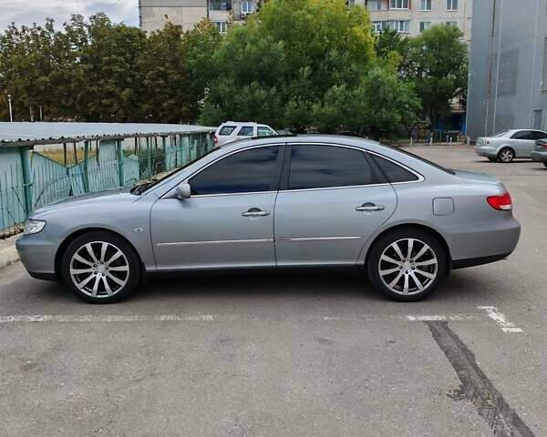 Сірий Хендай Грандер, об'ємом двигуна 3.34 л та пробігом 235 тис. км за 8000 $, фото 2 на Automoto.ua