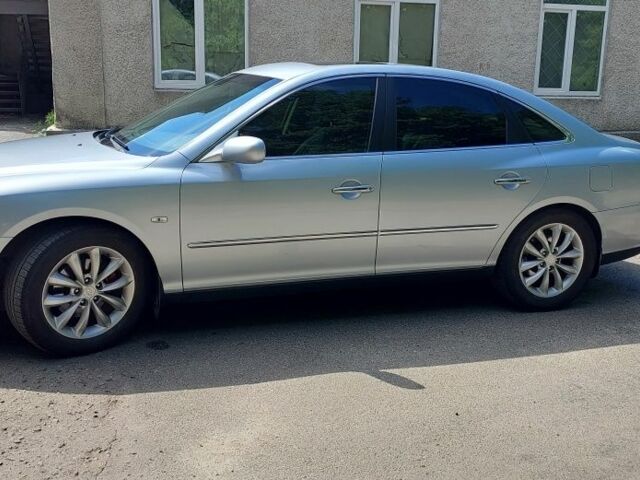 Сірий Хендай Грандер, об'ємом двигуна 3.3 л та пробігом 235 тис. км за 7200 $, фото 2 на Automoto.ua