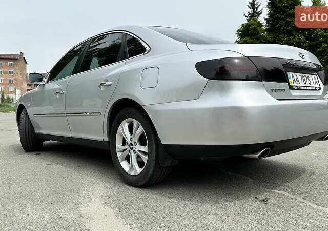 Серый Хендай Грандер, объемом двигателя 2.7 л и пробегом 247 тыс. км за 6700 $, фото 2 на Automoto.ua