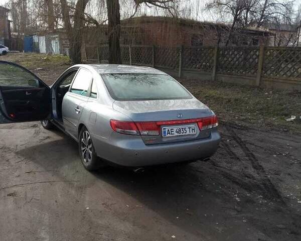 Серый Хендай Грандер, объемом двигателя 3.3 л и пробегом 88 тыс. км за 8800 $, фото 2 на Automoto.ua