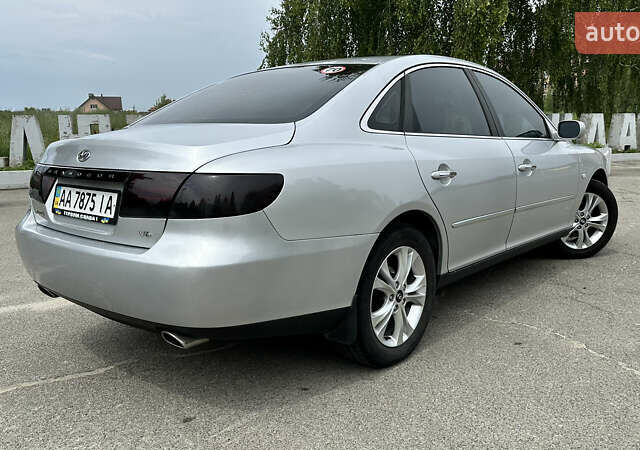 Серый Хендай Грандер, объемом двигателя 2.7 л и пробегом 247 тыс. км за 6700 $, фото 4 на Automoto.ua