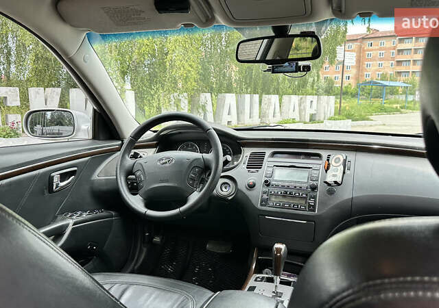 Серый Хендай Грандер, объемом двигателя 2.7 л и пробегом 247 тыс. км за 6700 $, фото 7 на Automoto.ua