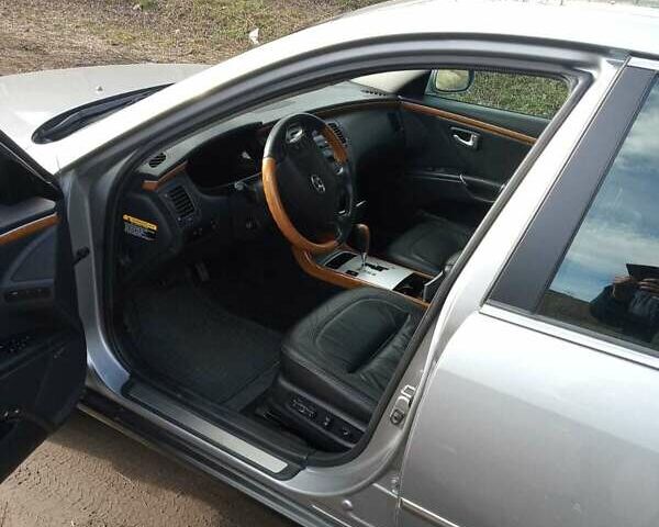 Серый Хендай Грандер, объемом двигателя 3.3 л и пробегом 88 тыс. км за 8800 $, фото 1 на Automoto.ua