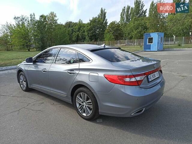 Серый Хендай Грандер, объемом двигателя 3 л и пробегом 255 тыс. км за 10900 $, фото 2 на Automoto.ua