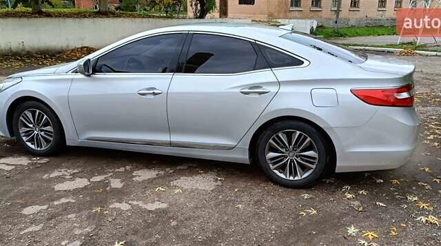 Серый Хендай Грандер, объемом двигателя 3 л и пробегом 247 тыс. км за 10700 $, фото 1 на Automoto.ua