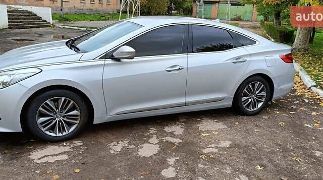 Серый Хендай Грандер, объемом двигателя 3 л и пробегом 247 тыс. км за 10700 $, фото 2 на Automoto.ua