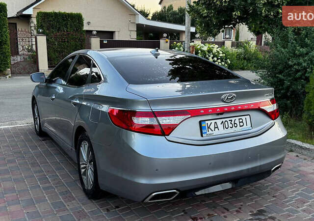 Серый Хендай Грандер, объемом двигателя 3 л и пробегом 295 тыс. км за 11000 $, фото 9 на Automoto.ua